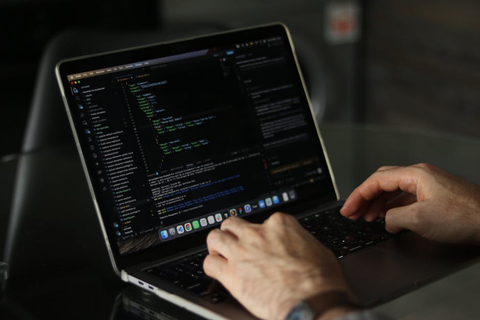 The image displays a computer screen with a dark background featuring lines of colorful coding text, including CSS properties such as margin, border, padding, and background-color, written in various